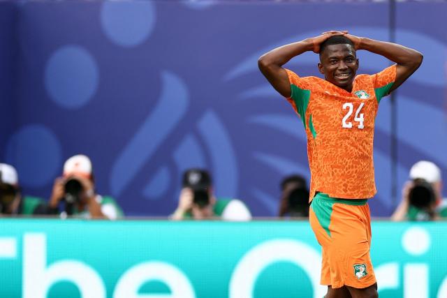 Ivory Coast's forward #24 Bazoumana Toure reacts after failing to score during the 2026 World Cup Group E football match between Ivory Coast and Ecuador at the Philadelphia Stadium in Philadelphia on June 14, 2026.  (Photo by CHARLY TRIBALLEAU / AFP)