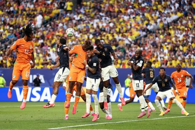 (L-R) Ivory Coast's forward #12 Elye Wahi heads the ball past Ecuador's midfielder #15 Pedro Vite, Ivory Coast's defender #20 Emmanuel Agbadou, Ecuador's defender #03 Piero Hincapie, defender #04 Joel Ordonez, and forward #13 Enner Valencia during the 2026 World Cup Group E football match between Ivory Coast and Ecuador at the Philadelphia Stadium in Philadelphia on June 14, 2026.  (Photo by CHARLY TRIBALLEAU / AFP)