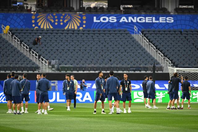 Iran’s players walk around the pitch after the press conference at Los Angeles Stadium in Inglewood on June 14, 2026, on the eve of the 2026 World Cup football match between Iran and New Zealand. (Photo by Patrick T. FALLON / AFP)