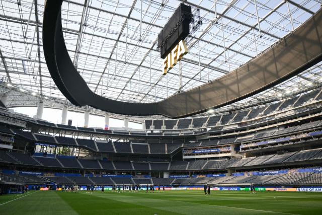Iran’s players walk around the pitch after the press conference at Los Angeles Stadium in Inglewood on June 14, 2026, on the eve of the 2026 World Cup football match between Iran and New Zealand. (Photo by Patrick T. FALLON / AFP)