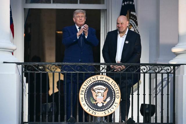 US President Donald Trump and UFC CEO Dana White stand for the national anthem during the "UFC Freedom 250" mixed martial arts event on the South Lawn of the White House in Washington, DC, June 14, 2026. (Photo by Kent NISHIMURA / AFP)