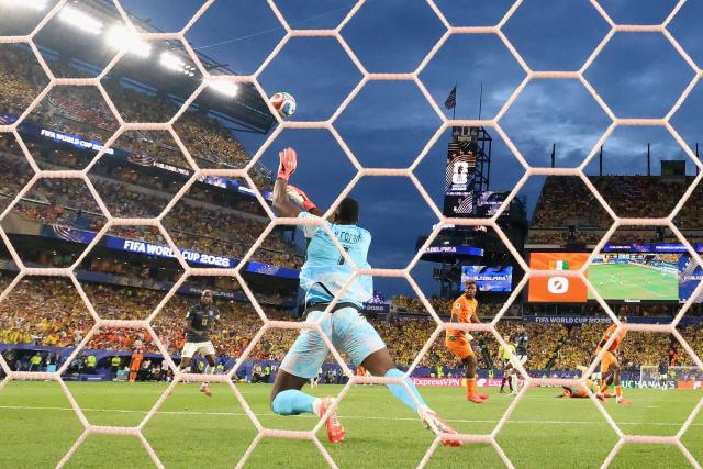 Ivory Coast's goalkeeper #01 Yahia Fofana makes a save during the 2026 World Cup Group E football match between Ivory Coast and Ecuador at the Philadelphia Stadium in Philadelphia on June 14, 2026.  (Photo by CHARLY TRIBALLEAU / AFP)