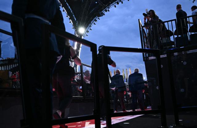 US President Donald Trump (R) and President and CEO of Ultimate Fighting Championship Dana White arrive ahead of the "UFC Freedom 250" mixed martial arts event on the South Lawn of the White House in Washington, DC, June 14, 2026. (Photo by Brendan SMIALOWSKI / AFP)