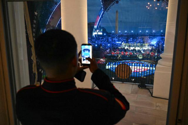 An overall view of the "UFC Freedom 250" mixed martial arts event on the South Lawn of the White House, as seen from the Blue Room Balcony of the White House in Washington, DC, June 14, 2026. (Photo by SAUL LOEB / POOL / AFP)