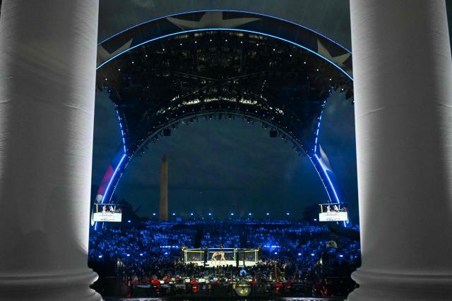 An overall view of the "UFC Freedom 250" mixed martial arts event on the South Lawn of the White House, as seen from the Blue Room Balcony of the White House in Washington, DC, June 14, 2026. (Photo by SAUL LOEB / POOL / AFP)