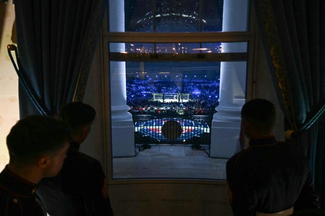 An overall view of the "UFC Freedom 250" mixed martial arts event on the South Lawn of the White House, as seen from the Blue Room Balcony of the White House in Washington, DC, June 14, 2026. (Photo by SAUL LOEB / POOL / AFP)