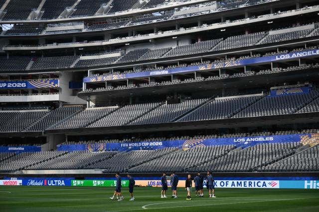 Iran’s players walk around the pitch after the press conference at Los Angeles Stadium in Inglewood on June 14, 2026, on the eve of the 2026 World Cup football match between Iran and New Zealand. (Photo by Patrick T. FALLON / AFP)