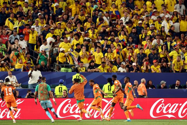 Ivory Coast's forward #15 Amad Diallo (C) celebrates scoring his team's first goal during the 2026 World Cup Group E football match between Ivory Coast and Ecuador at the Philadelphia Stadium in Philadelphia on June 14, 2026.  (Photo by CHARLY TRIBALLEAU / AFP)