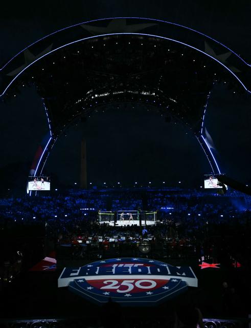 Mixed martial artists Brazil's Diego Lopes and US's Steve Garcia fight in their featherweight bout during the "UFC Freedom 250" mixed martial arts event on the South Lawn of the White House in Washington, DC, June 14, 2026. (Photo by Brendan SMIALOWSKI / AFP)
