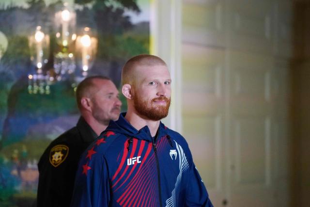 America's Bo Nickal walks through the Diplomatic Reception Room of the White House on his way to his bout during the "UFC Freedom 250" mixed martial arts event in Washington, DC, June 14, 2026. (Photo by Elizabeth Frantz / POOL / AFP)