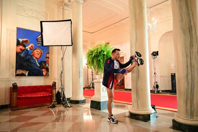 America's Michael Chandler warms up in the Grand Foyer of the White House before his lightweight bout against Brazil's Mauricio Ruffy during the "UFC Freedom 250" mixed martial arts event on the South Lawn of the White House in Washington, DC, June 14, 2026. (Photo by SAUL LOEB / POOL / AFP)
