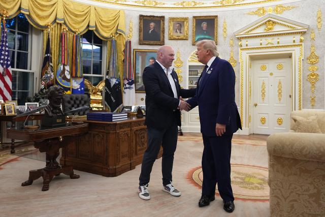 US President Donald Trump and UFC President and CEO Dana White shake hands before walking out of the Oval Office during UFC Freedom 250 on the South Lawn of the White House, in Washington, DC, on June 14, 2026. (Photo by Al Drago / POOL / AFP)