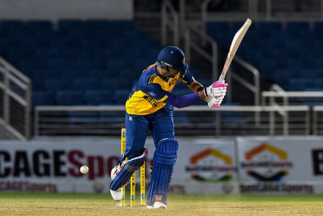 Dasun Shanaka of Sri Lanka is bowled by Jason Holder of West Indies during the third Twenty20 (T20) international cricket match between West Indies and Sri Lanka at Sabina Park in Kingston, Jamaica, on June 14, 2026. (Photo by Randy Brooks / AFP)