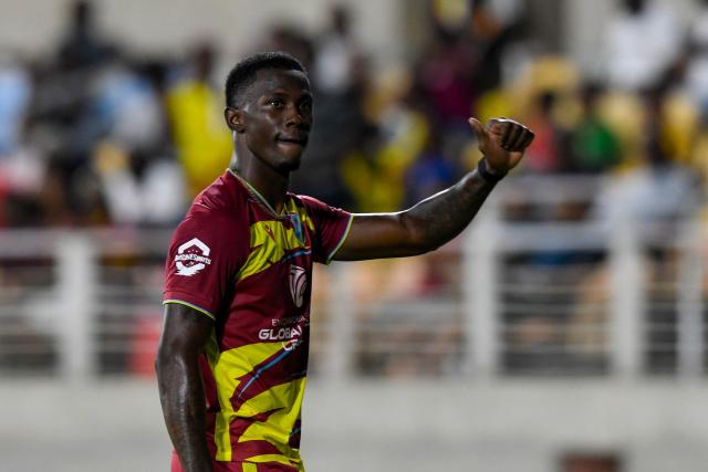Shamar Joseph of West Indies wave to fans after talking 5 wickets for 33 runs during the third Twenty20 (T20) international cricket match between West Indies and Sri Lanka at Sabina Park in Kingston, Jamaica, on June 14, 2026. (Photo by Randy Brooks / AFP)
