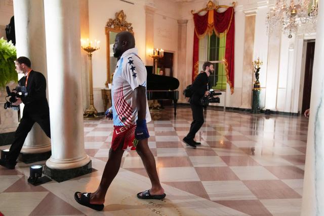 America's mixed martial artist Derrick Lewis walks through the White House before his heavyweight bout with America's mixed martial artist Josh Hokit, during UFC Freedom 250 on the South Lawn of the White House, in Washington, DC, on June 14, 2026. (Photo by Jacquelyn Martin / POOL / AFP)