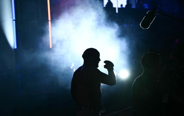 Mixed martial artist US's Josh Hokit leaves after defeating US's Derrick Lewis in their heavyweight bout during the "UFC Freedom 250" mixed martial arts event on the South Lawn of the White House in Washington, DC, June 14, 2026. (Photo by Brendan SMIALOWSKI / AFP)