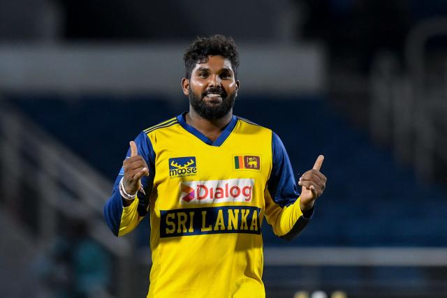 Wanindu Hasaranga of Sri Lanka celebrates the dismissal of Brandon King of West Indies during the third Twenty20 (T20) international cricket match between West Indies and Sri Lanka at Sabina Park in Kingston, Jamaica, on June 14, 2026. (Photo by Randy Brooks / AFP)
