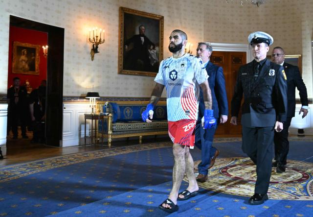 Canada's Aiemann Zahabi walks through Blue Room of the White House ahead of his bantamweight fight against US's Sean O'Malley during the "UFC Freedom 250" mixed martial arts event in Washington, DC, June 14, 2026. (Photo by SAUL LOEB / POOL / AFP)