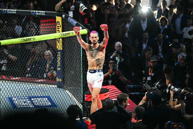 America's Sean O'Malley celebrates after defeating Canada's Aiemann Zahabi during their bantamweight bout during the "UFC Freedom 250" mixed martial arts event on the South Lawn of the White House in Washington, DC, June 14, 2026. (Photo by Kent NISHIMURA / AFP)