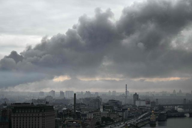 Smoke rises following a Russian missile strike on the Ukrainian capital Kyiv on June 15, 2026, amid the Russian invasion in Ukraine. Russia fired a barrage of missiles at several major Ukrainian cities, setting Kyiv's historic Dormition Cathedral on fire and killing nine, while Ukraine strikes claimed three lives south of Moscow. (Photo by Genya SAVILOV / AFP)