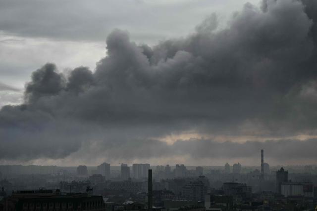 Smoke rises following a Russian missile strike on the Ukrainian capital Kyiv on June 15, 2026, amid the Russian invasion in Ukraine. Russia fired a barrage of missiles at several major Ukrainian cities, setting Kyiv's historic Dormition Cathedral on fire and killing nine, while Ukraine strikes claimed three lives south of Moscow. (Photo by Genya SAVILOV / AFP)