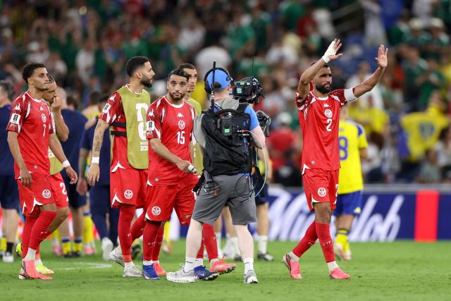 Tunisia's players react after losing the 2026 World Cup Group F football match between Sweden and Tunisia at the Monterrey Stadium in Guadalupe on June 14, 2026.  (Photo by Julio Cesar AGUILAR / AFP)