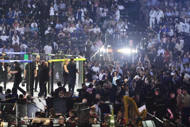 US President Donald Trump, in the lower right wearing a white hat, attends UFC Freedom 250 on the South Lawn of the White House, in Washington, DC, on June 15, 2026. (Photo by Jacquelyn Martin / POOL / AFP)