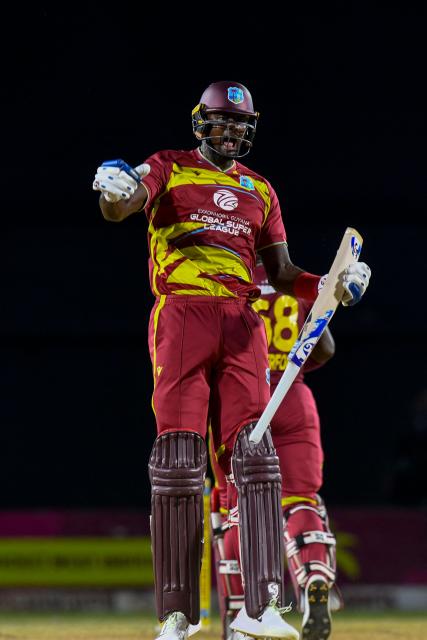 Jason Holder of West Indies celebrates winning the third Twenty20 (T20) international cricket match between West Indies and Sri Lanka at Sabina Park in Kingston, Jamaica, on June 14, 2026.  (Photo by Randy Brooks / AFP)