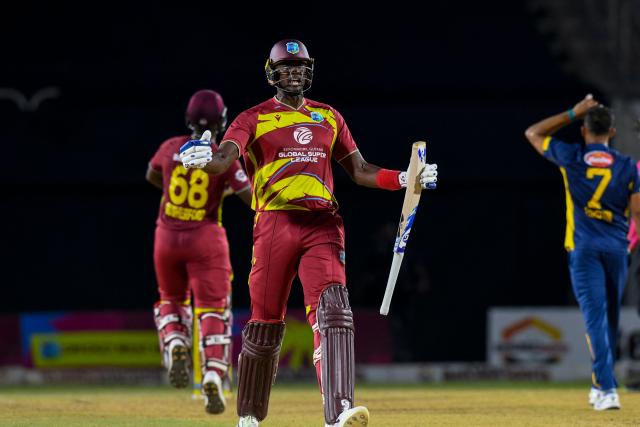 Jason Holder of West Indies celebrates winning the third Twenty20 (T20) international cricket match between West Indies and Sri Lanka at Sabina Park in Kingston, Jamaica, on June 14, 2026.  (Photo by Randy Brooks / AFP)