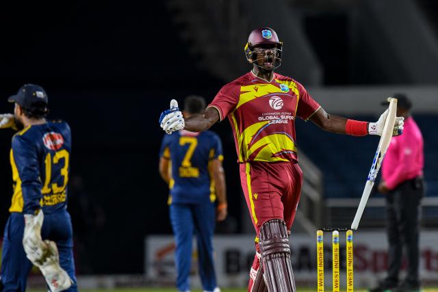 Jason Holder of West Indies celebrates winning the third Twenty20 (T20) international cricket match between West Indies and Sri Lanka at Sabina Park in Kingston, Jamaica, on June 14, 2026.  (Photo by Randy Brooks / AFP)
