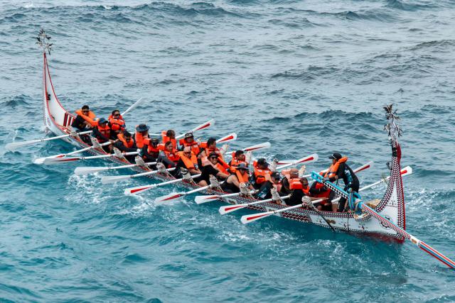The Tao (Yami) indigenous rowers paddle a traditional wooden canoe called Ovayan (Golden Friendship) during its voyage to Philippines' Batanes Islands, along the coastline at Orchid island (or Lanyu island), southeastern Taiwan on June 15, 2026. (Photo by CHENG Yu-chen / AFP)