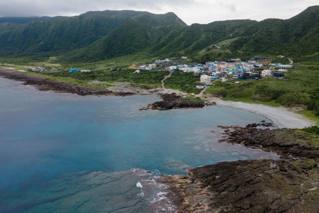 An aerial view shows a coastline at the Orchid island (or Lanyu island), southeastern Taiwan on June 14, 2026. (Photo by CHENG Yu-chen / AFP)