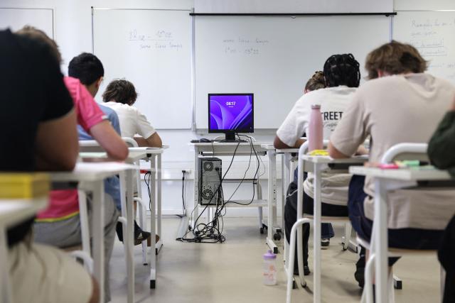 Students start working as a 4 hours philosophy dissertation kicks off the French general baccalaureat exam for getting into university, at Bellevue high school, in Toulouse, south-western France on June 15, 2026. More than 700,000 candidates across France take the 2026 session of the Baccalaureat or "bac", the secondary school diploma required for access to higher education, with written exams running from June 15 to 18 and oral examinations through early July. (Photo by Valentine CHAPUIS / AFP)