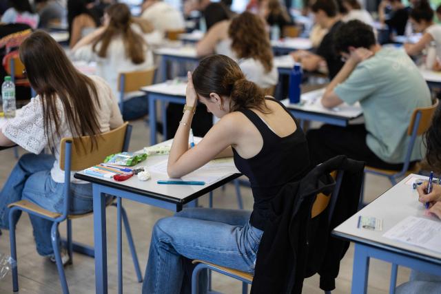 Students start working as a 4 hours philosophy dissertation kicks off the French general baccalaureat exam for getting into university, in Quimper on June 15, 2026. More than 700,000 candidates across France take the 2026 session of the Baccalaureat or "bac", the secondary school diploma required for access to higher education, with written exams running from June 15 to 18 and oral examinations through early July. (Photo by Fred TANNEAU / AFP)