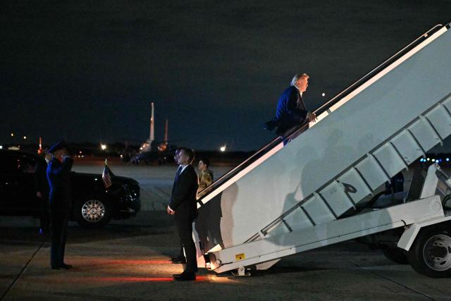 Guest US President Donald Trump boards Air Force One before departing Joint Base Andrews in Maryland to fly to Evian-les-Bains, France, for the G7 summit on June 15, 2026. Trump is heading to Evian, France to attend the G7 Summit. Allies from the G7 group of leading powers will seek common ground with US President at a summit in France that gets underway hours after the US and Iran agreed a deal to end the Middle East war. (Photo by Mandel NGAN / AFP)