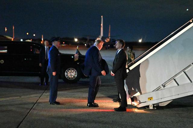 Guest US President Donald Trump arrives to board Air Force One before departing Joint Base Andrews in Maryland to fly to Evian-les-Bains, France, for the G7 summit on June 15, 2026. Trump is heading to Evian, France to attend the G7 Summit. Allies from the G7 group of leading powers will seek common ground with US President at a summit in France that gets underway hours after the US and Iran agreed a deal to end the Middle East war. (Photo by Mandel NGAN / AFP)