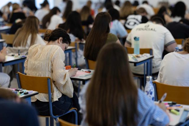 Students start working as a 4 hours philosophy dissertation kicks off the French general baccalaureat exam for getting into university, in Quimper on June 15, 2026. More than 700,000 candidates across France take the 2026 session of the Baccalaureat or "bac", the secondary school diploma required for access to higher education, with written exams running from June 15 to 18 and oral examinations through early July. (Photo by Fred TANNEAU / AFP)