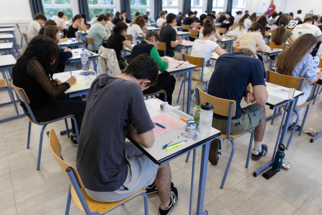 Students start working as a 4 hours philosophy dissertation kicks off the French general baccalaureat exam for getting into university, in Quimper on June 15, 2026. More than 700,000 candidates across France take the 2026 session of the Baccalaureat or "bac", the secondary school diploma required for access to higher education, with written exams running from June 15 to 18 and oral examinations through early July. (Photo by Fred TANNEAU / AFP)