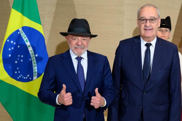 Swiss Federal President Guy Parmelin (R) and Brazil's President Luiz Inacio Lula da Silva pose upon arrival for a bilateral meeting ahead of the G7 summit, in Evian, eastern France, on June 15, 2026. A G7 summit is set to take place June 15 to 17 in the French town of Evian-les-Bains near Switzerland and it will be attended by country leaders as well as the EU's foreign policy chief and ministers from Brazil, Canada, the United Arab Emirates and Turkey. (Photo by LAURENT GILLIERON / POOL / AFP)