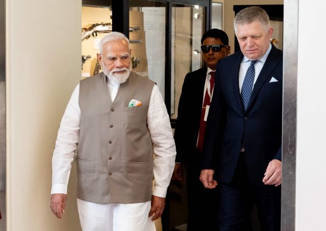 Slovakia's prime minister Robert Fico (R) welcomes Indian Prime Minister Narendra Modi (L) at Bratislava’s castle in Bratislava, Slovakia, on June 15, 2026. (Photo by Joe Klamar / AFP)