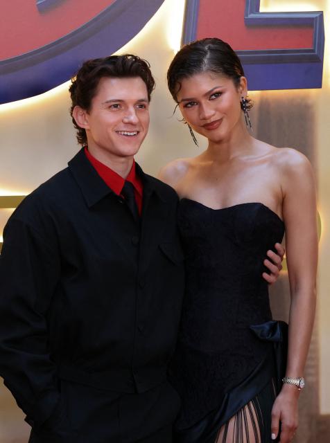 US actress Zendaya and British actor Tom Holland pose during a photocall for « Spider-Man: brand new day »  movie in a hotel in Madrid on June 15, 2026. (Photo by Thomas COEX / AFP)