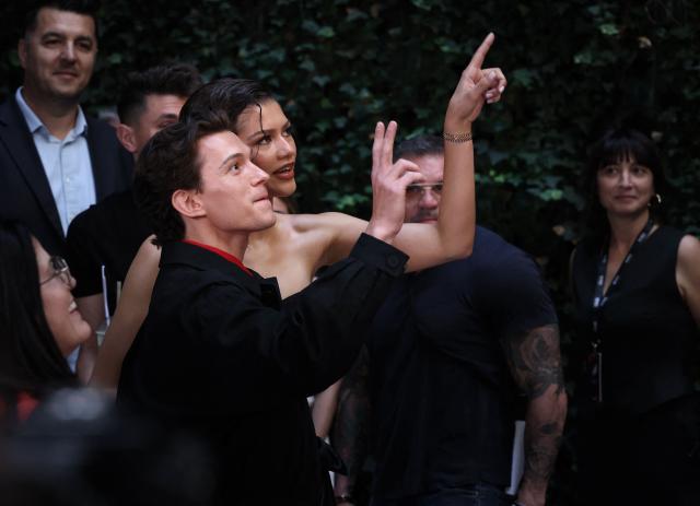 US actress Zendaya and British actor Tom Holland react during a photocall for « Spider-Man: brand new day »  movie in a hotel in Madrid on June 15, 2026. (Photo by Thomas COEX / AFP)