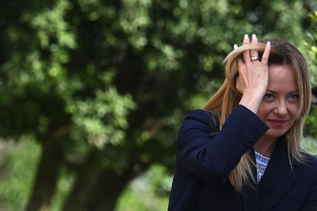 Italy's Prime Minister, Giorgia Meloni gestures as she welcomes Japan's Prime Minister before a meeting at Villa Doria Pamphili in Rome on June 15, 2026. (Photo by Andreas SOLARO / AFP)