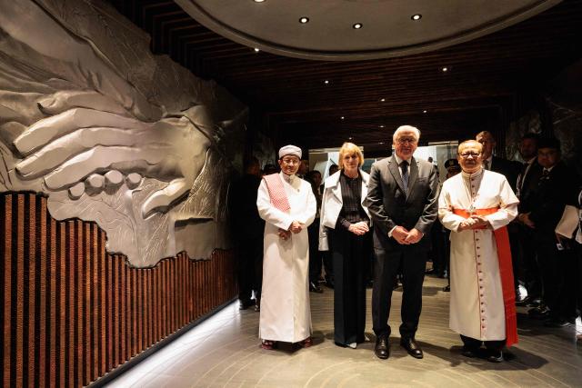 Germany's President Frank-Walter Steinmeier (2nd R) and First Lady Elke Buedenbender (2nd L) pose with Indonesia's Religious Affairs Minister and Grand Imam of Istiqlal Mosque Nasaruddin Umar (L) and Cardinal Ignatius Suharyo Hardjoatmodjo, the Archbishop of Jakarta, inside the Tunnel of Friendship, an underground passage linking Istiqlal Mosque and Jakarta Cathedral, in Jakarta on June 15, 2026. (Photo by Yasuyoshi Chiba / AFP)