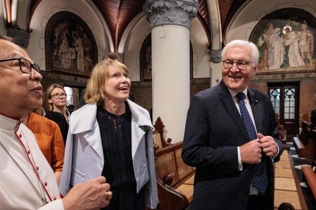 Germany's President Frank-Walter Steinmeier (R) and First Lady Elke Buedenbender (C) are guided by Cardinal Ignatius Suharyo Hardjoatmodjo, the Archbishop of Jakarta, during a visit to Jakarta Cathedral in Jakarta on June 15, 2026. (Photo by Yasuyoshi Chiba / AFP)