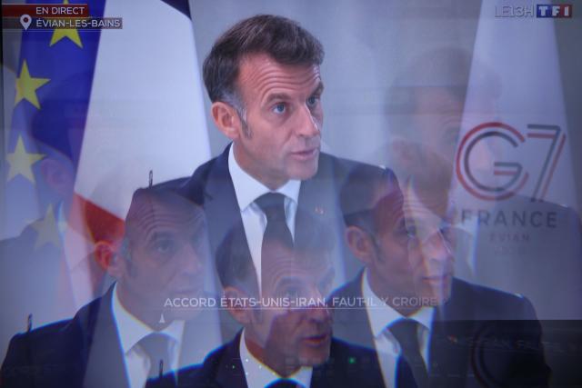 This photograph shows a monitor in a media control room at AFP headquarters in Paris displaying France's President Emmanuel Macron speaking during an interview as part of French TV channel TF1's news broadcast on the sidelines of the G7 summit, in Evian, central-eastern France on June 15, 2026. A G7 summit is set to take place June 15 to 17 in the French town of Evian-les-Bains near Switzerland and it will be attended by country leaders as well as the EU's foreign policy chief and ministers from Brazil, Canada, the United Arab Emirates and Turkey. (Photo by SIMON WOHLFAHRT / AFP)