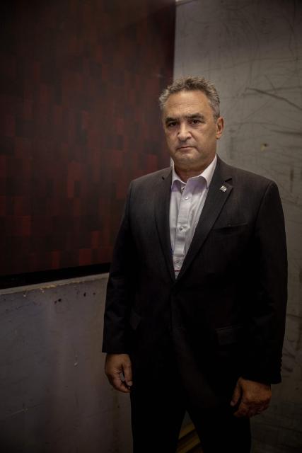 Israel's ambassador to France Joshua Zarka poses during a photo session at the stand of Israeli developer and manufacturer of defence and surveillance Electro-optic infrared (EO/IR) systems Controp that was later closed by organisers at the Eurosatory land and airland defence and security trade fair, at the Paris-Nord Villepinte Exhibition Centre in Villepinte, north of Paris on June 15, 2026. Twelve Israeli stands were closed at the Eurosatory defence and security exhibition, which opened on today, for failing to comply with the conditions that had been set, according to a statement received by AFP from the organising company, Coges Events. (Photo by Guillaume BAPTISTE / AFP)