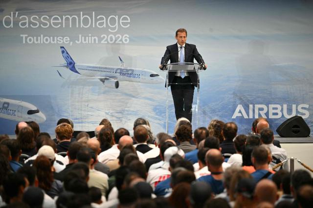 Airbus CEO Guillaume Faury delivers a speech addressing employees of the new Airbus A320 assembly line during its inauguration at the Airbus site in Cornebarrieu, south-western France on June 15, 2026. (Photo by Lionel BONAVENTURE / AFP)