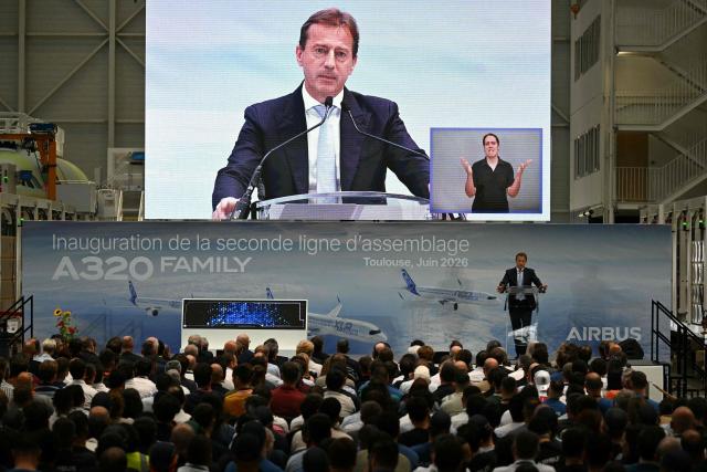 Airbus CEO Guillaume Faury delivers a speech addressing employees of the new Airbus A320 assembly line during its inauguration at the Airbus site in Cornebarrieu, south-western France on June 15, 2026. (Photo by Lionel BONAVENTURE / AFP)