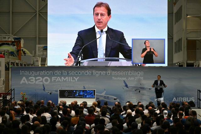 Airbus CEO Guillaume Faury delivers a speech addressing employees of the new Airbus A320 assembly line during its inauguration at the Airbus site in Cornebarrieu, south-western France on June 15, 2026. (Photo by Lionel BONAVENTURE / AFP)